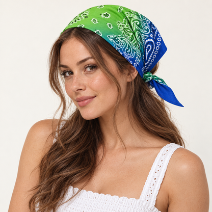 Model wearing a green and blue paisley bandana as a head scarf tied behind her head.