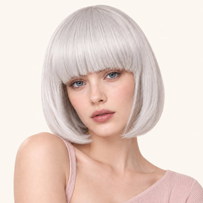 Model wearing a silver grey straight bob wig with full fringe.